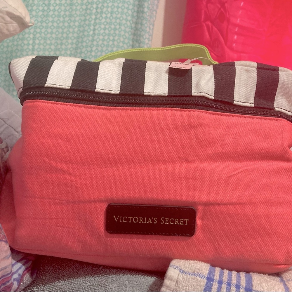 Victoria secret makeup bag with tags on it